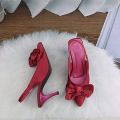 Bow frill heel